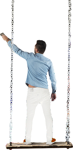 man standing on swing